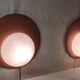 Designer wall lights in wood and opaline globe - mid-20th century