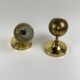 Pair of Guzzini brass spherical wall lights, 1970