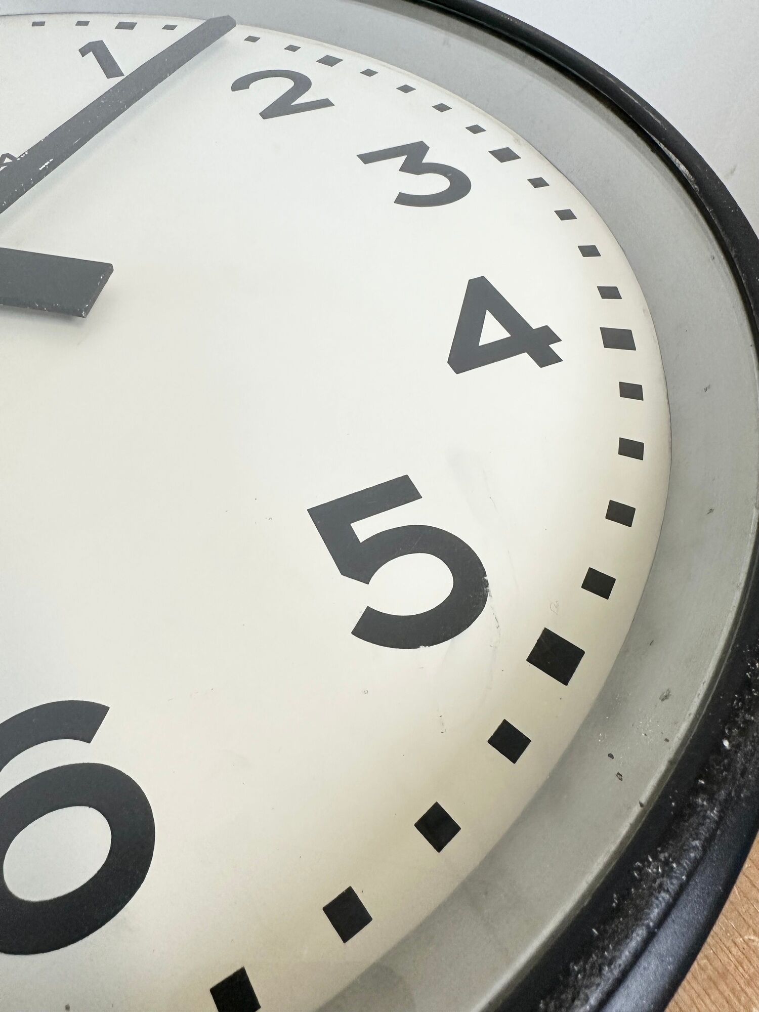 Black swiss industrial wall clock from inducta, 1960s