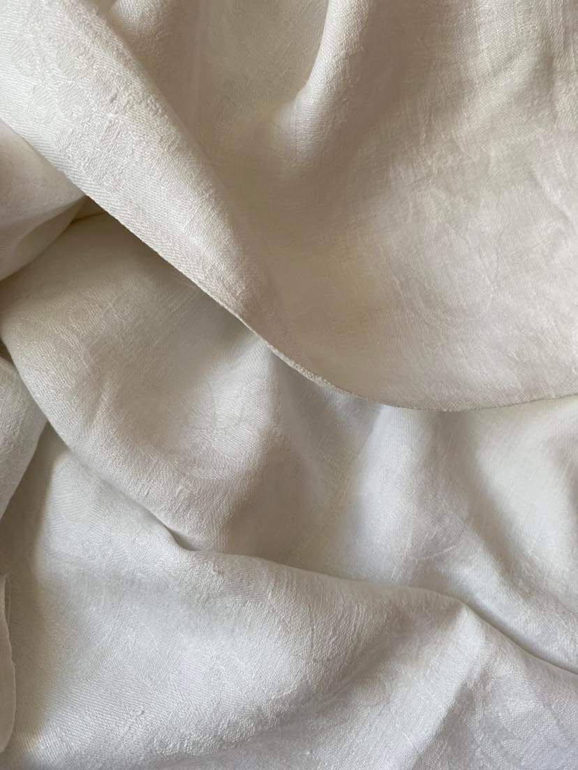 Old tablecloth in white cotton and monogram