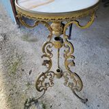 Round table in marble and gilded bronze