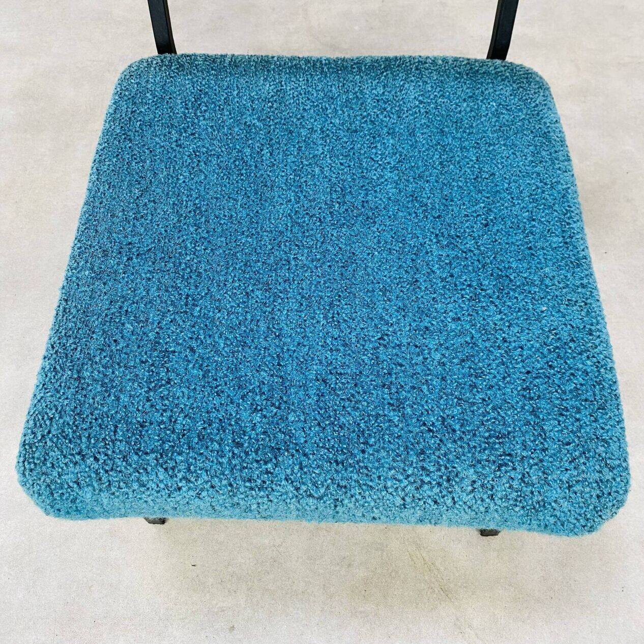 Modernist armchair from the 1950s in vintage blue boucle fabric.