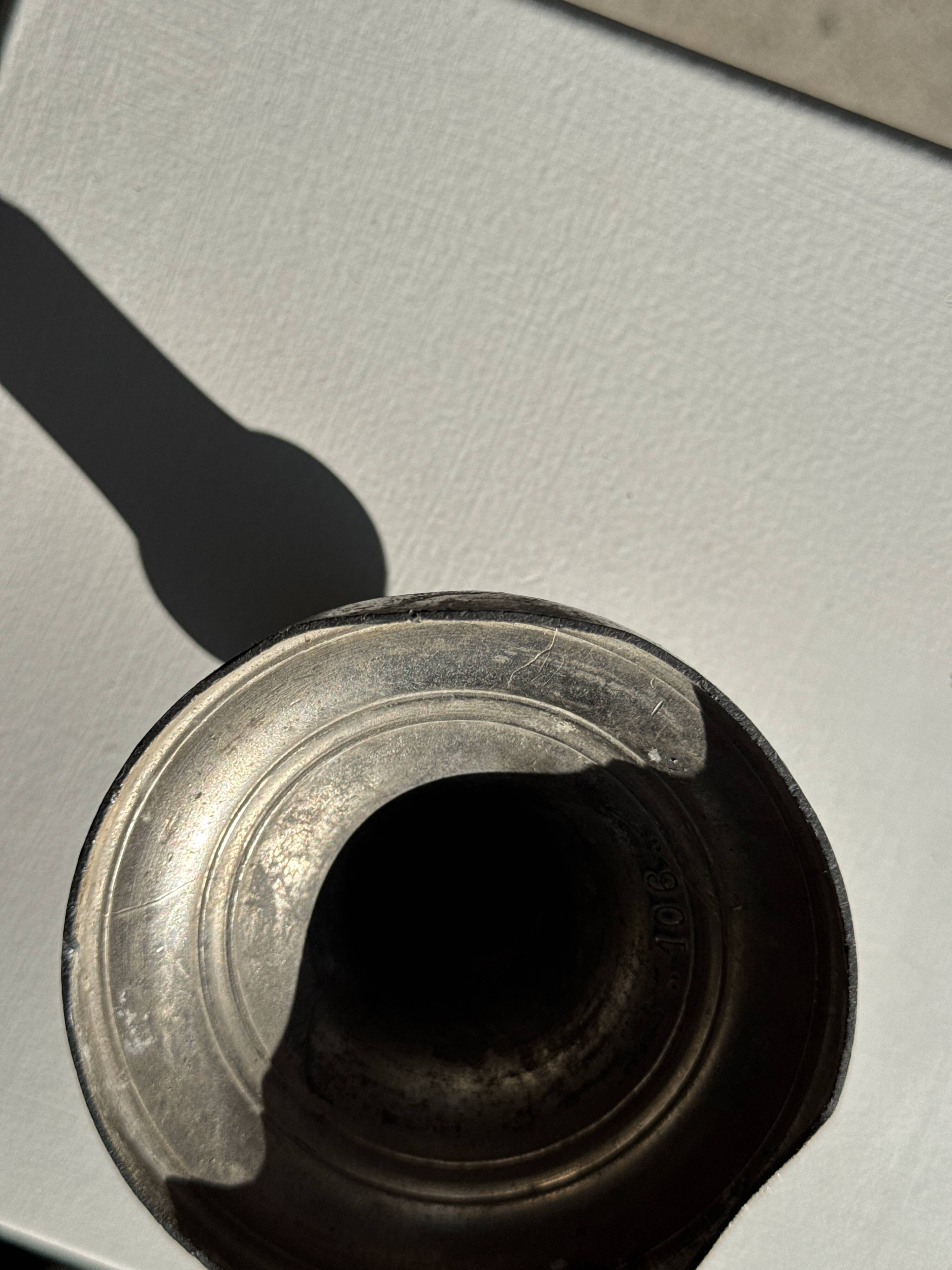 Small antique candle holder engraved in silver-plated metal, in its original condition.