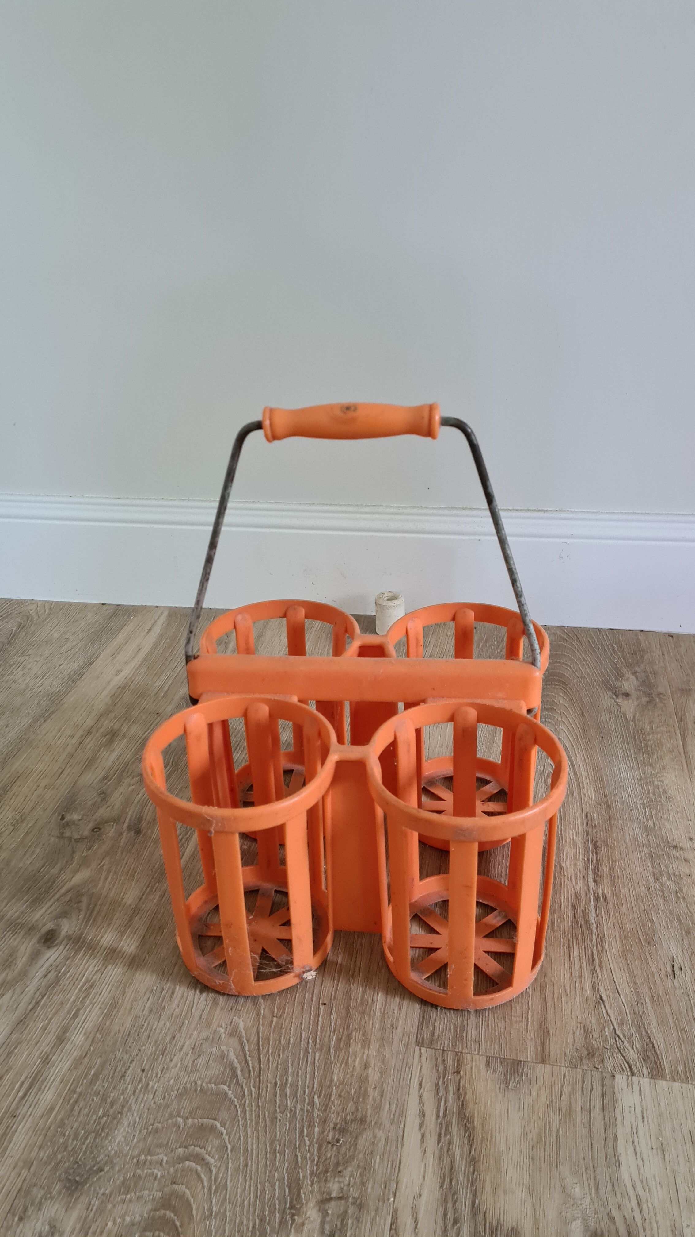 Orange pola 1970 plastic bottle holder