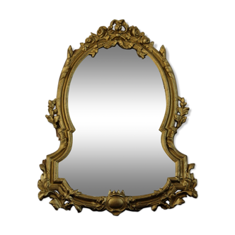 Baroque mirror bevelled in bronze