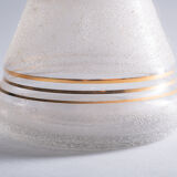 Récipient en verre avec finition dorée
