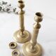 Pair of chiseled bronze Restoration candlesticks