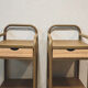 Old ochre metal bedside tables from a boarding school.
