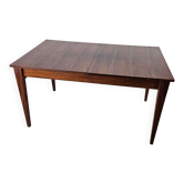 Extendable table in laminate