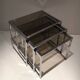 Suite de 3 tables gigognes chromées. Vers 1970