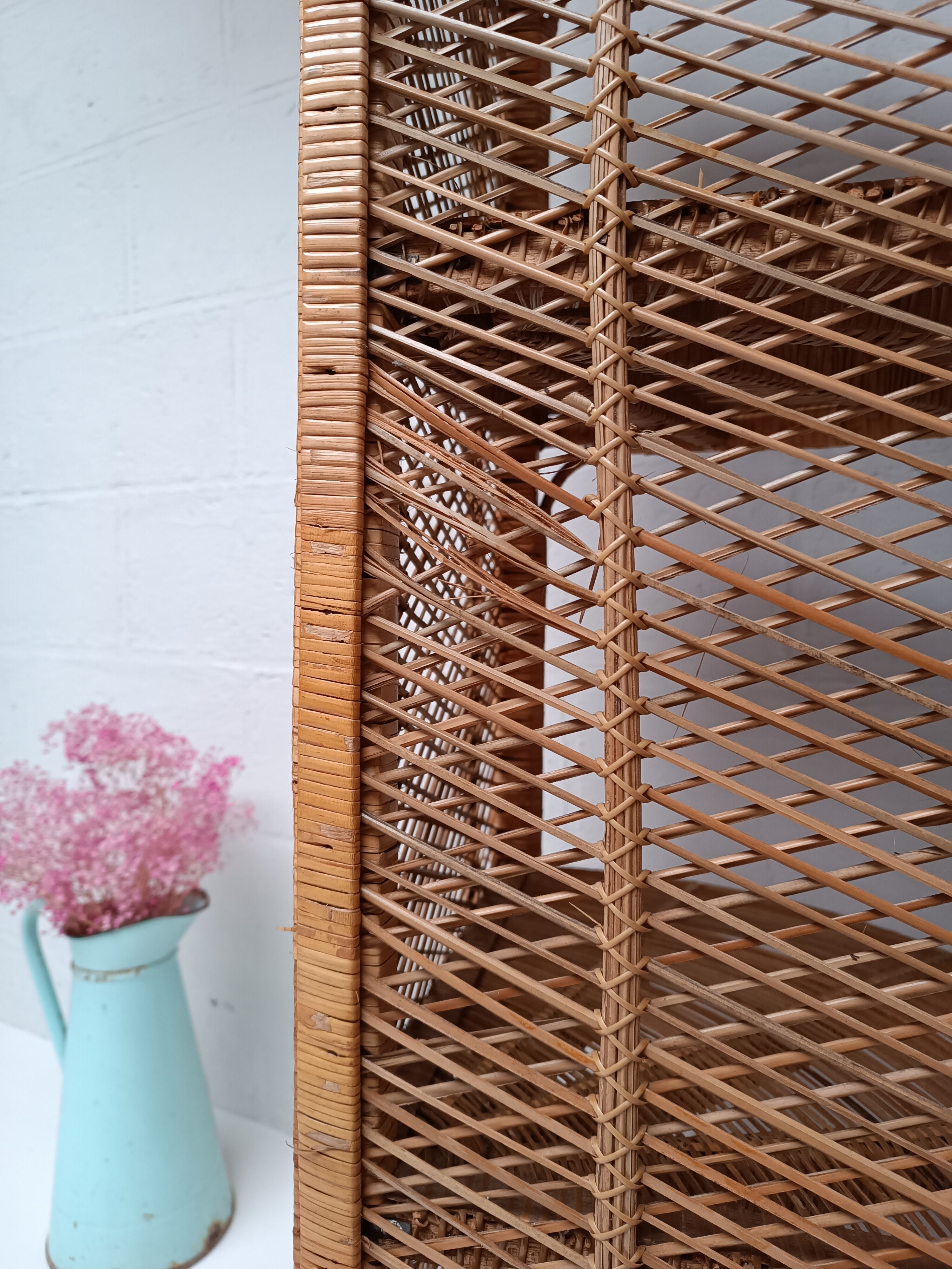 Tall rattan shelf
