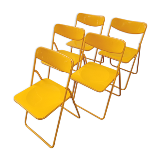 Orange vintage folding chairs
