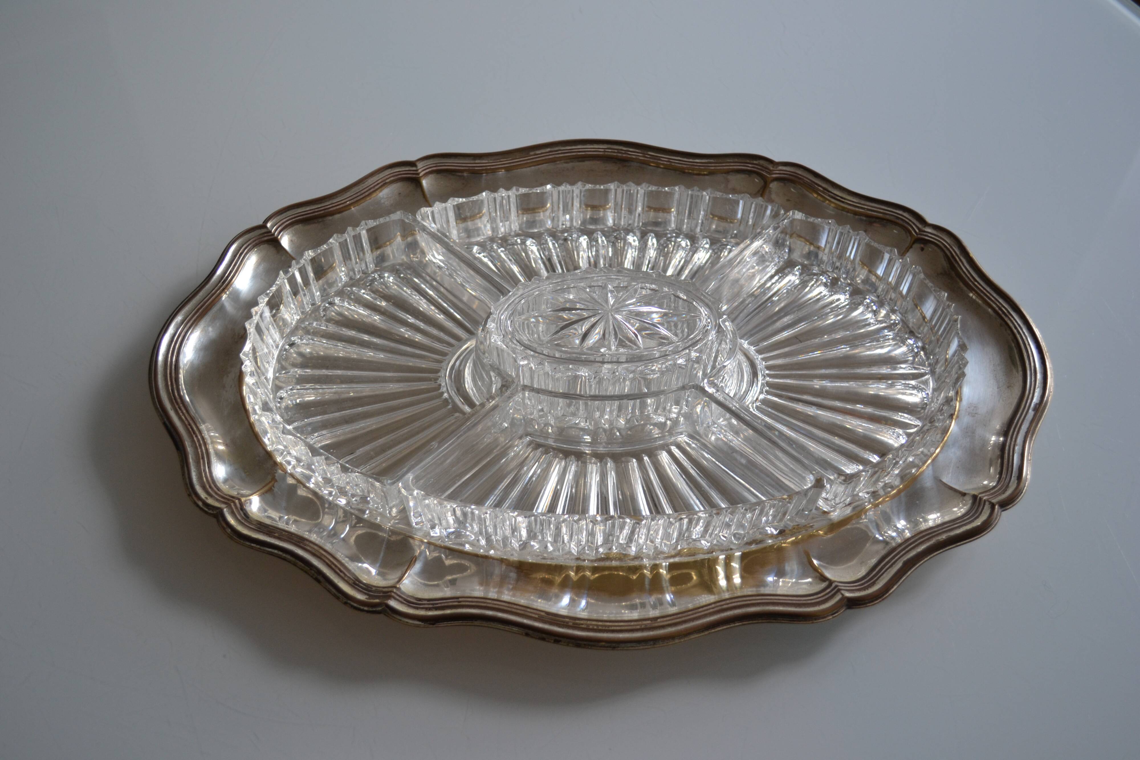 Silver-plated metal aperitif serving tray with HKE hallmark and glass.