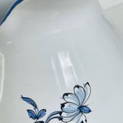 Moustiers pitcher with blue floral decoration