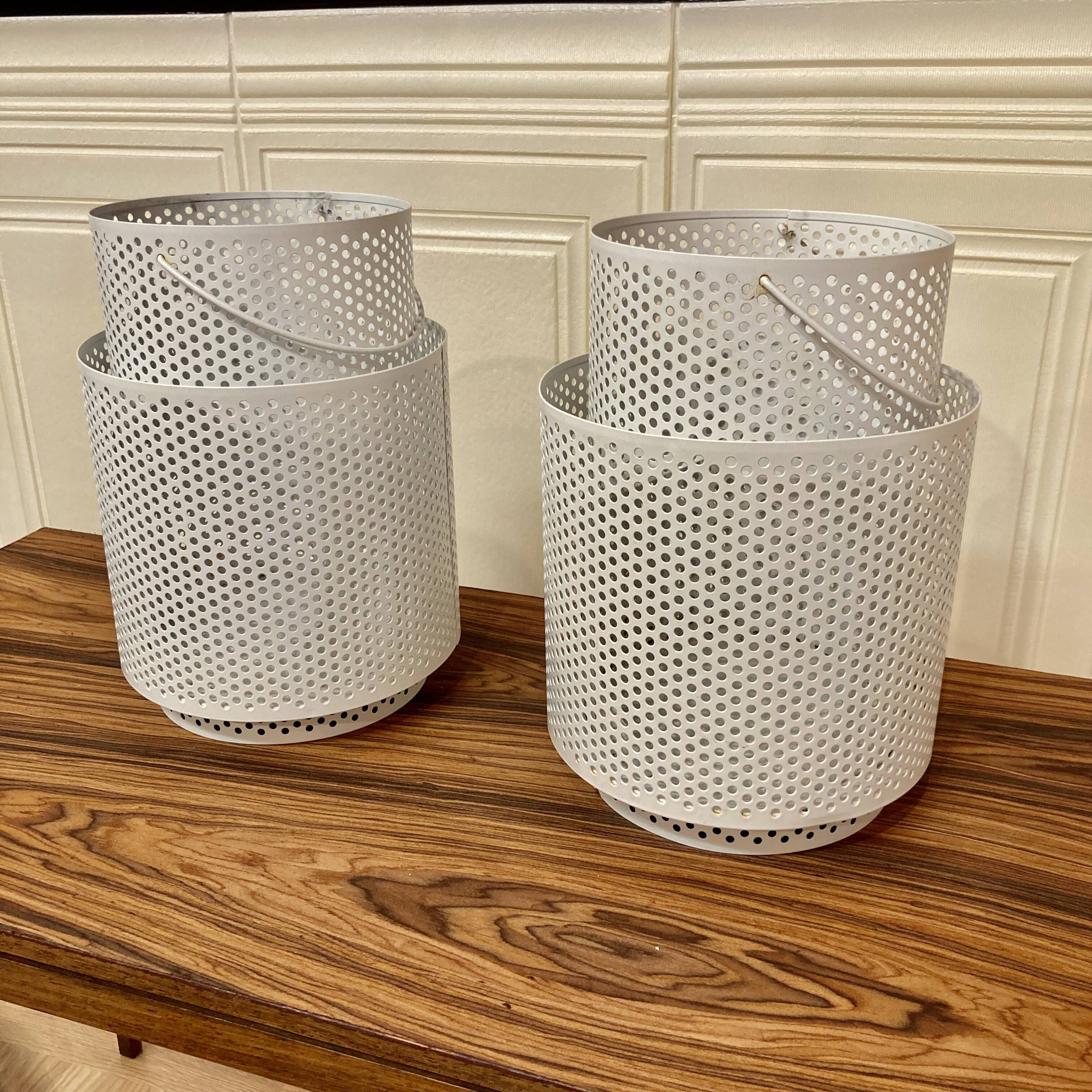 Set of 2 large metal candle holders in scandinavian design.