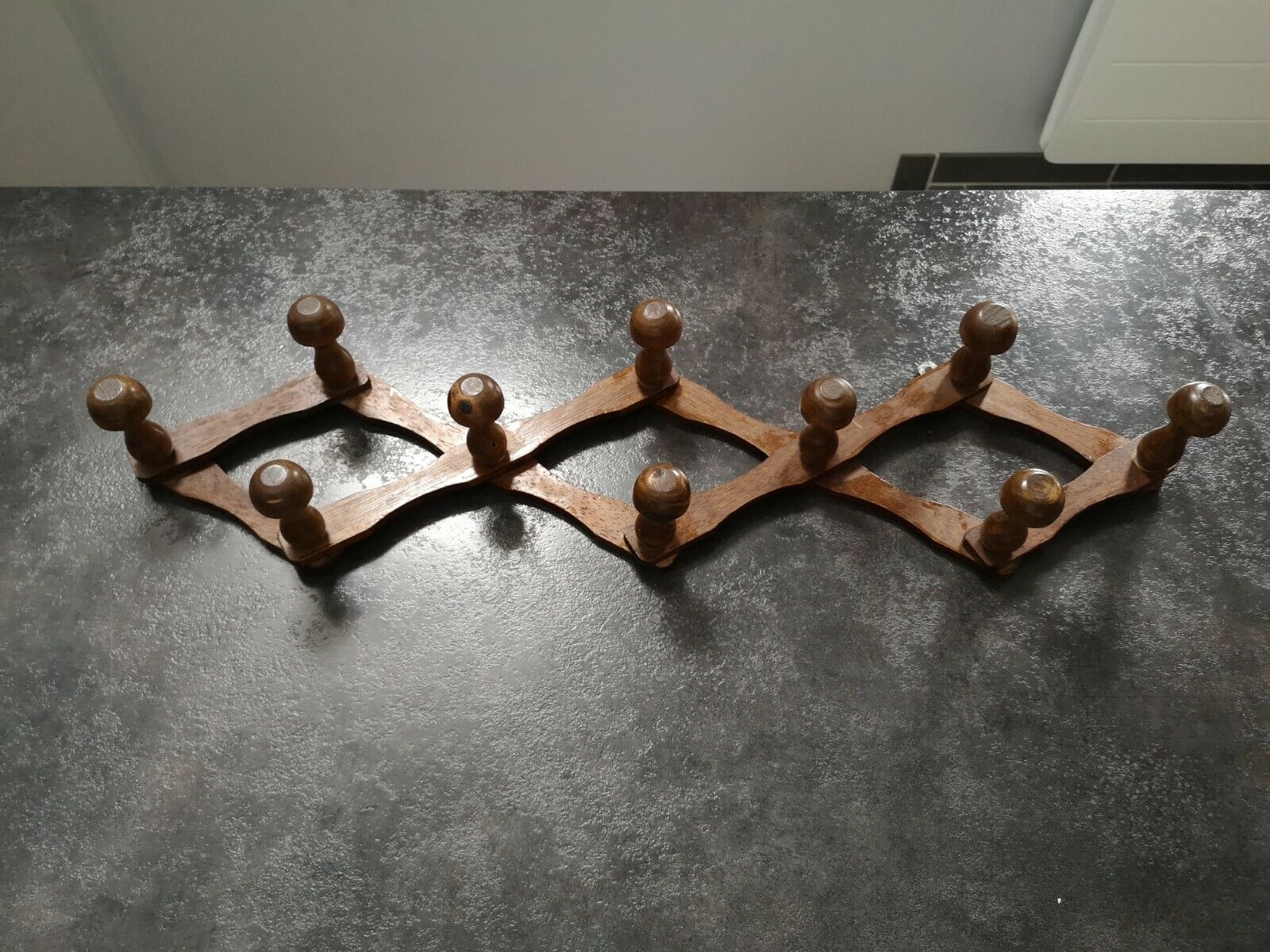 Old wall-mounted extender coat rack, wooden accordion, 10 patères