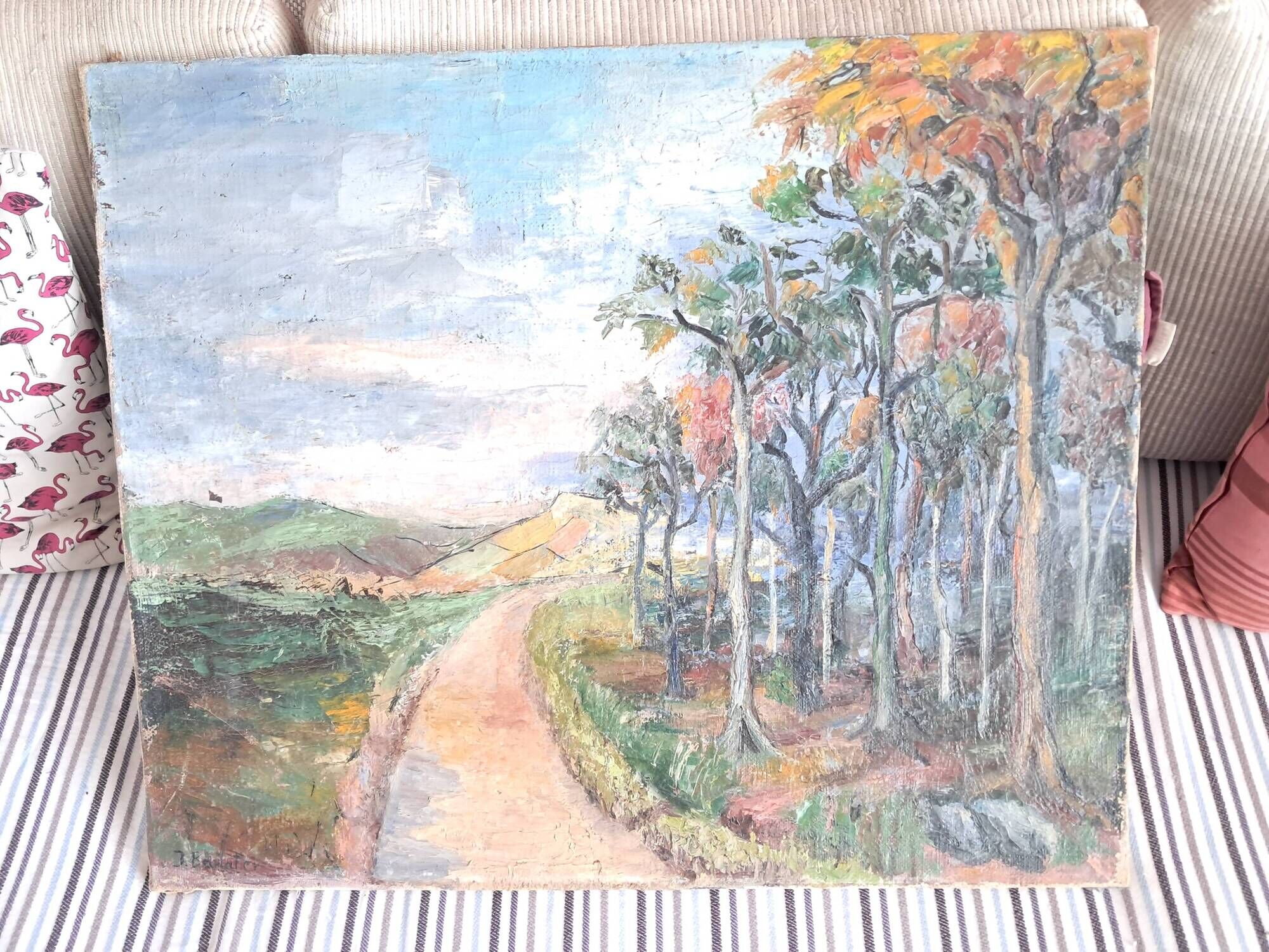 Large old oil painting depicting a landscape.