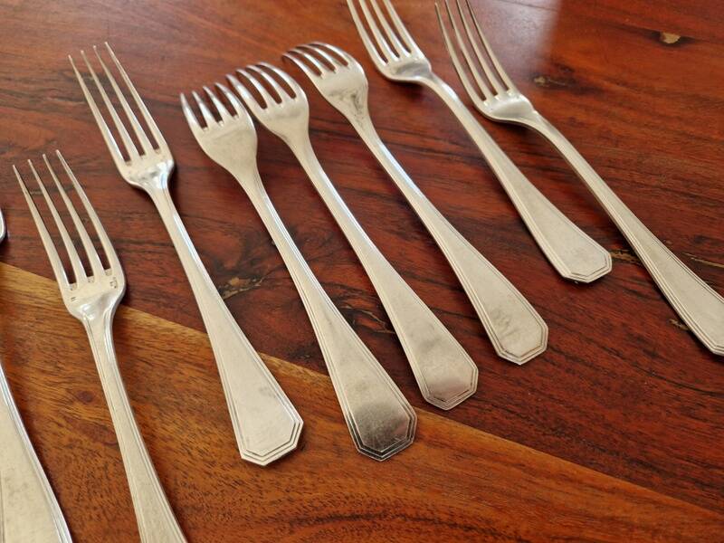 9 fourchettes de table Christofle en métal argenté modèle America - Design Luc Lanel