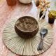 Bowl in natural coconut ecological plate