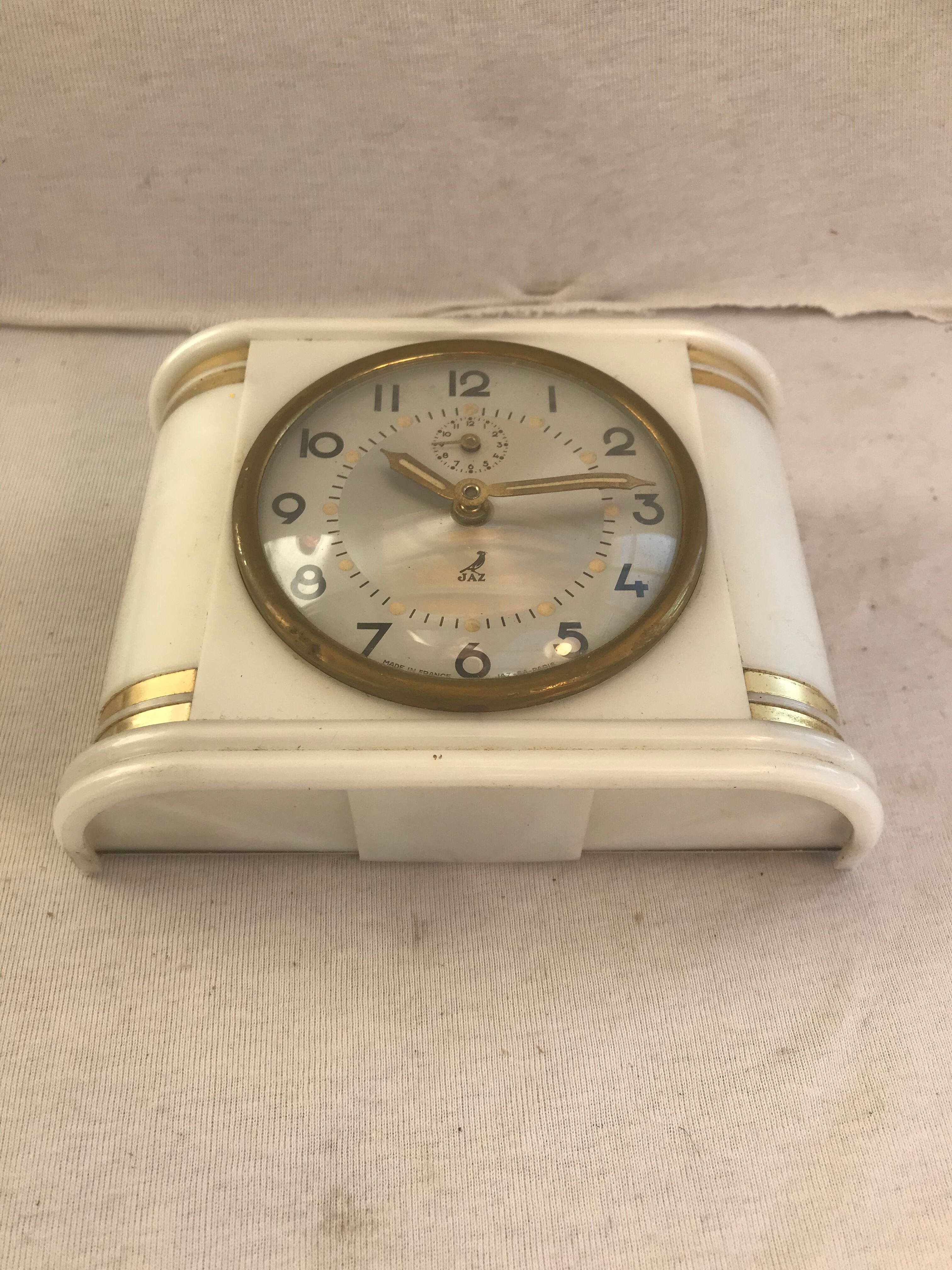 Ancien réveil jaz bakélite blanc