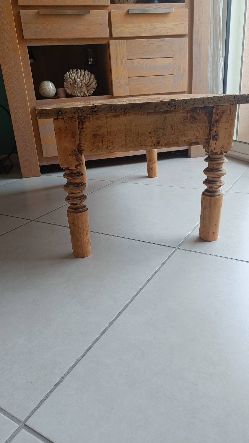 Raw wood coffee table in a country style