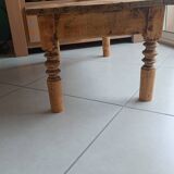 Raw wood coffee table in a country style