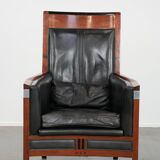 Black cowhide leather and wooden Art Deco design armchair
