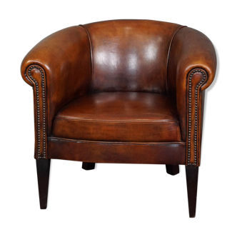 Brown leather armchair