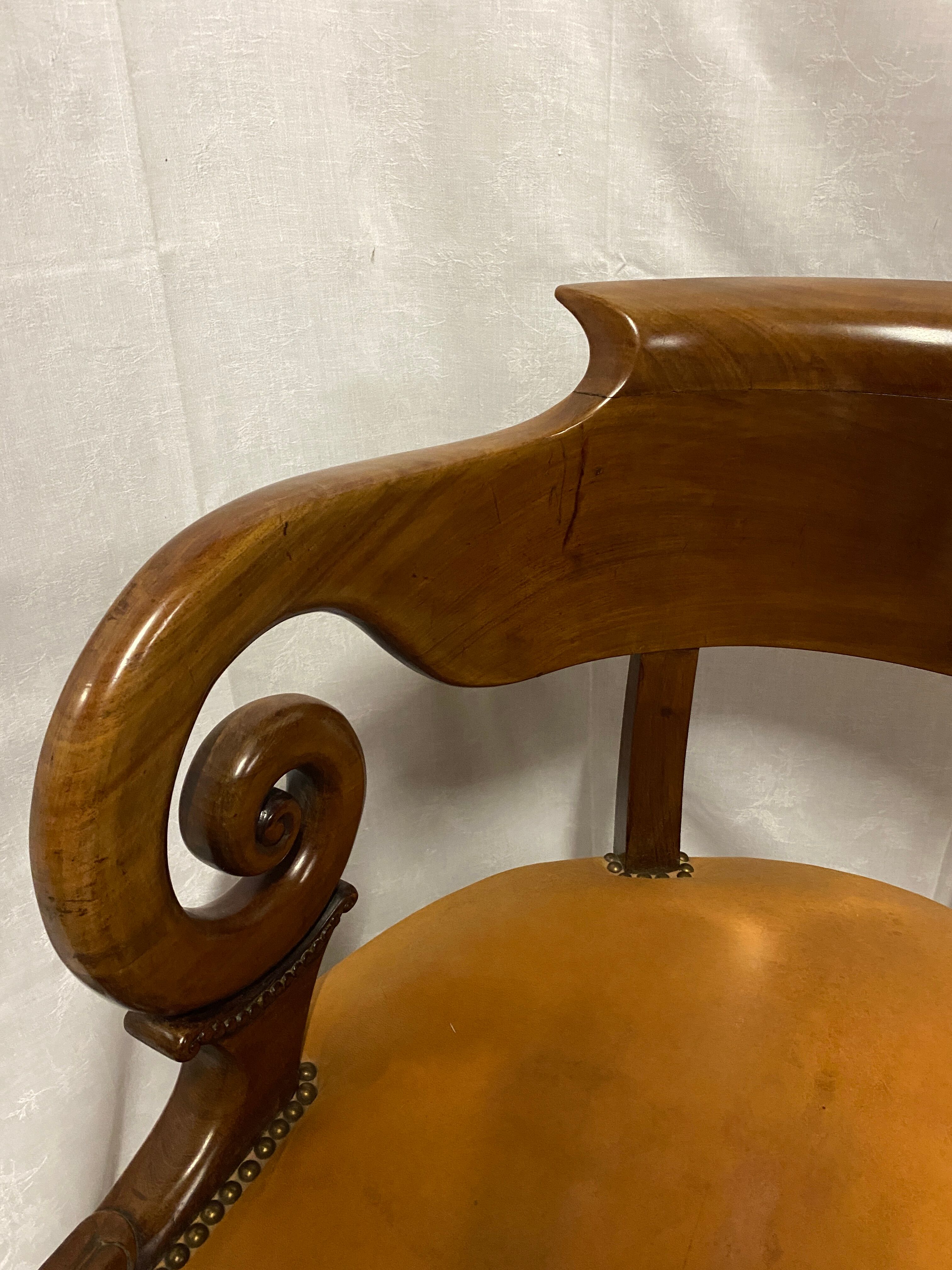 Mahogany office armchair with roll-ups