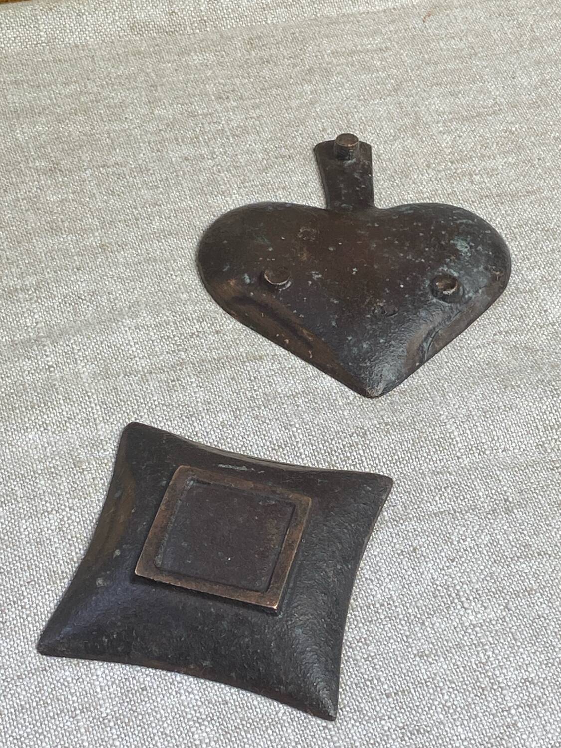 Bronze spade and diamond ashtrays