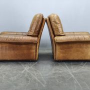 Paire de fauteuils lounge en cuir buffle cognac Arcon Italia