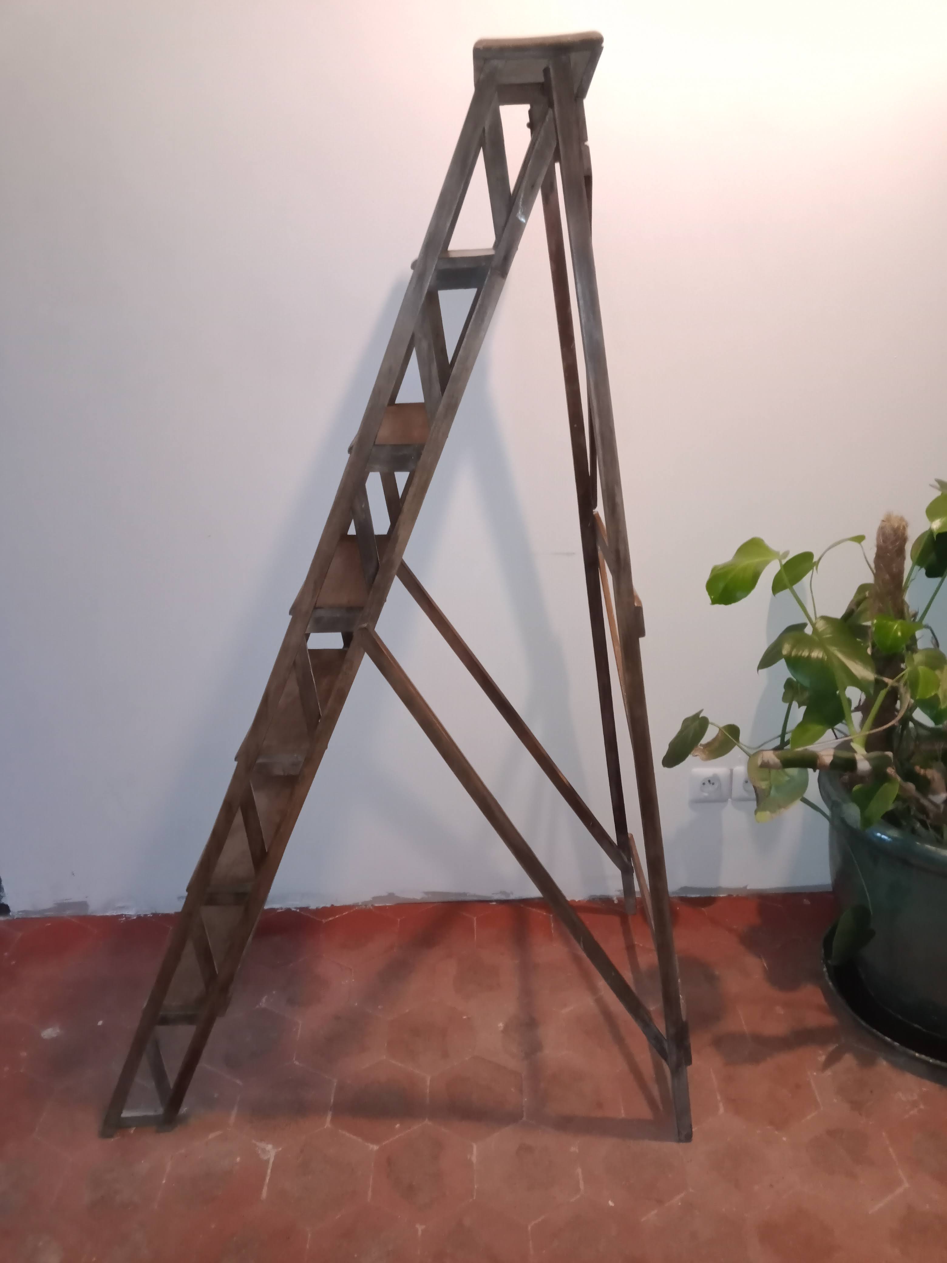 Old wooden stepladder six steps
