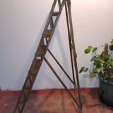 Old wooden stepladder six steps
