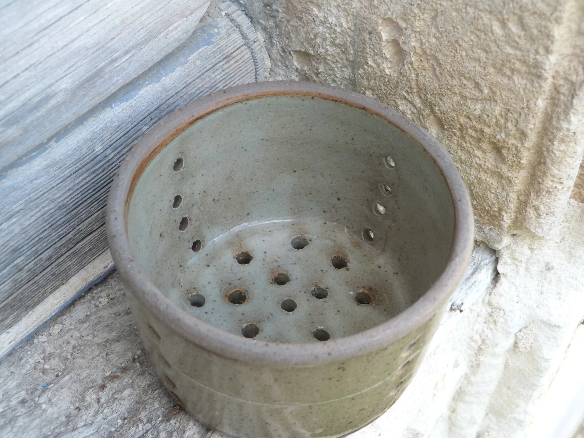 Old stoneware cheese drainer