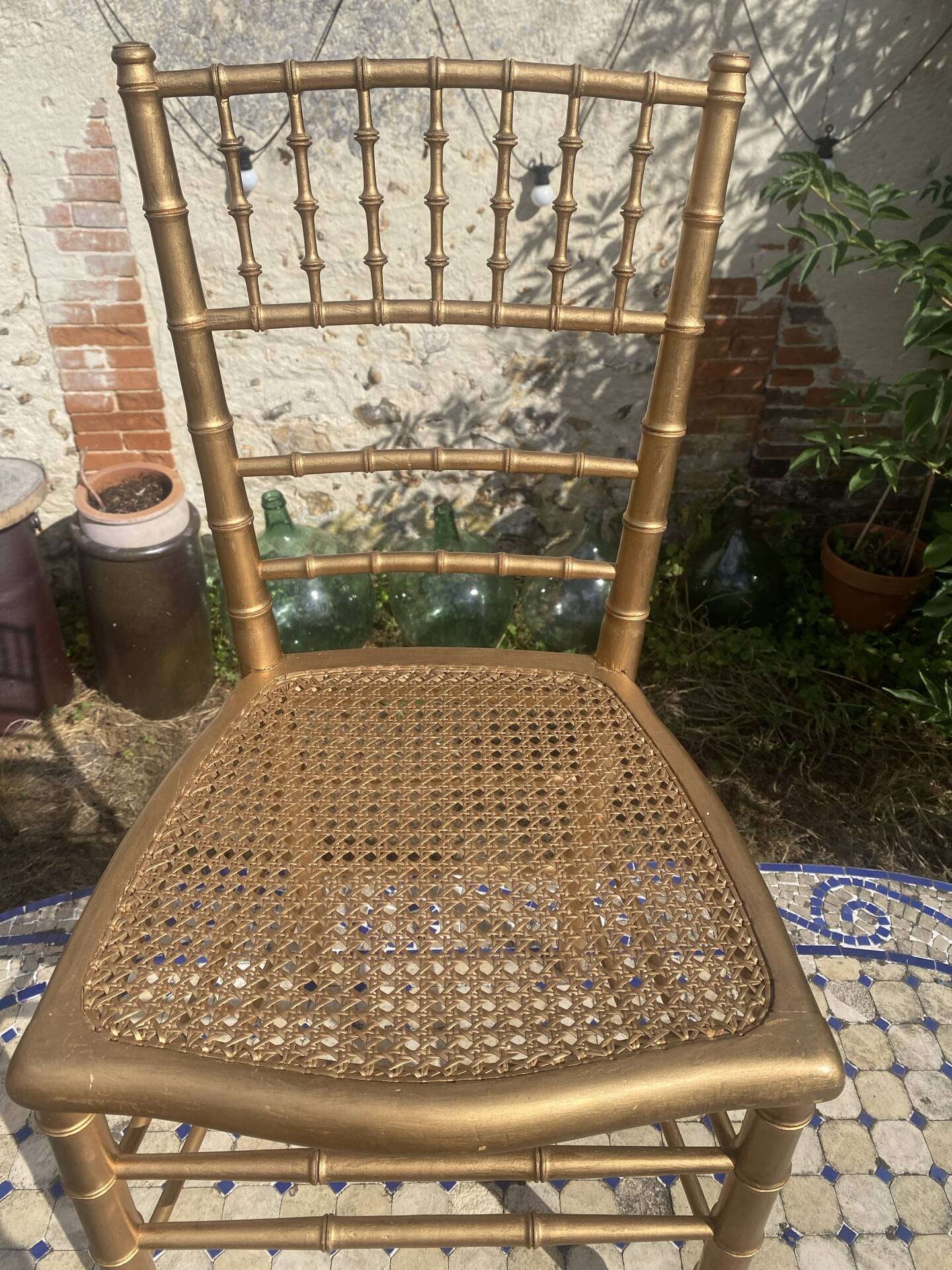 Antique golden bamboo-style chair