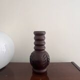 Brown wooden vase folk art