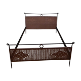 Black metal and rattan bed frame