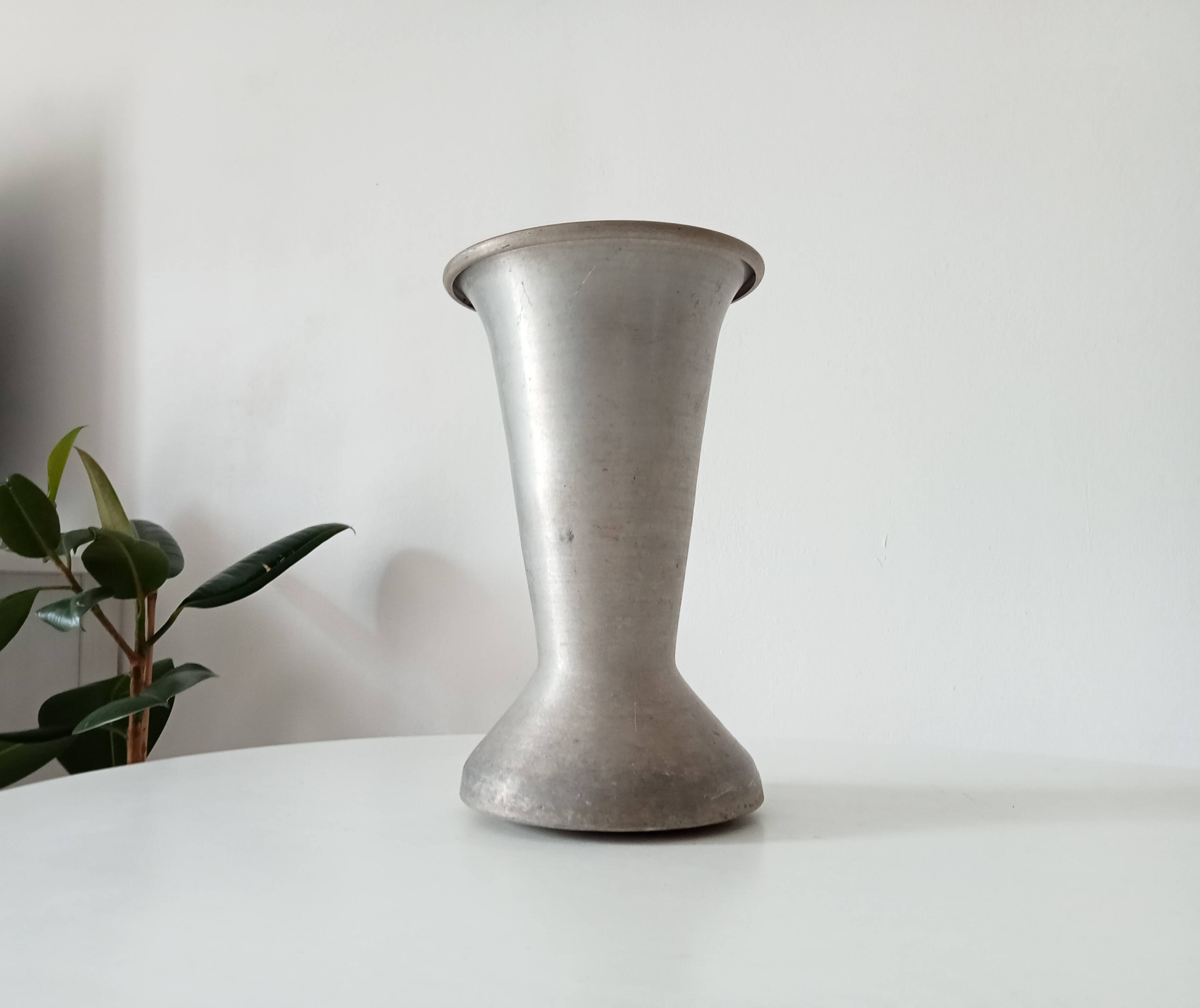 Antique aluminum cemetery vase
