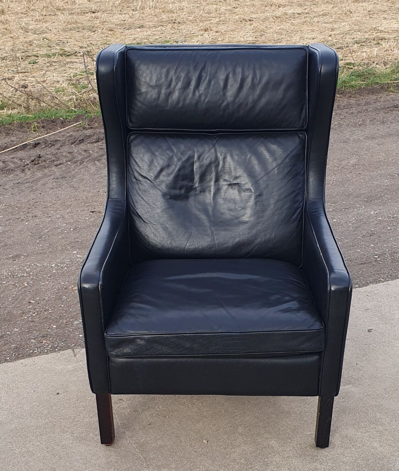 Vintage black leather scandinavian wingback chair Lulu Stouby