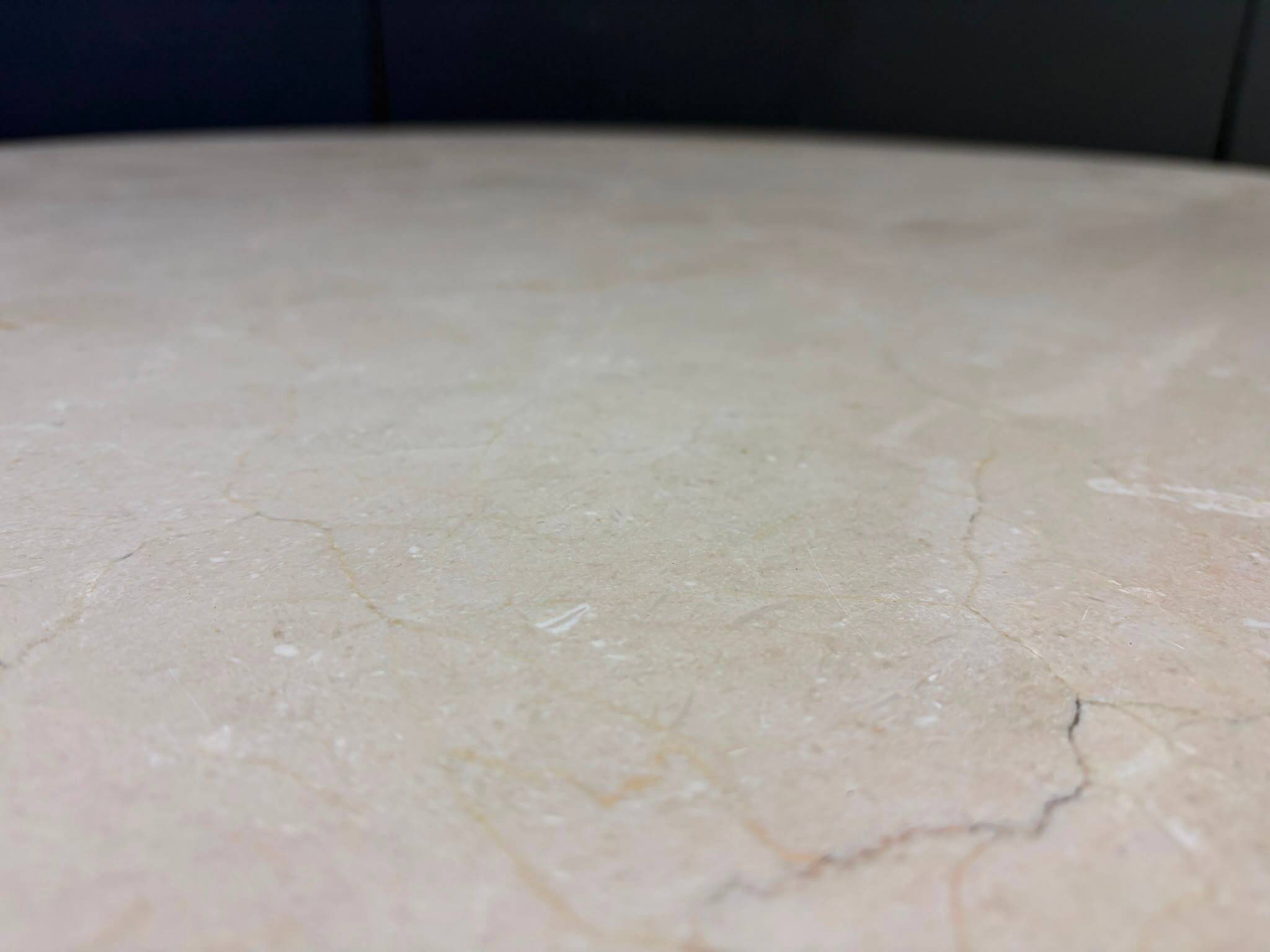 Round French travertine dining table 1970s