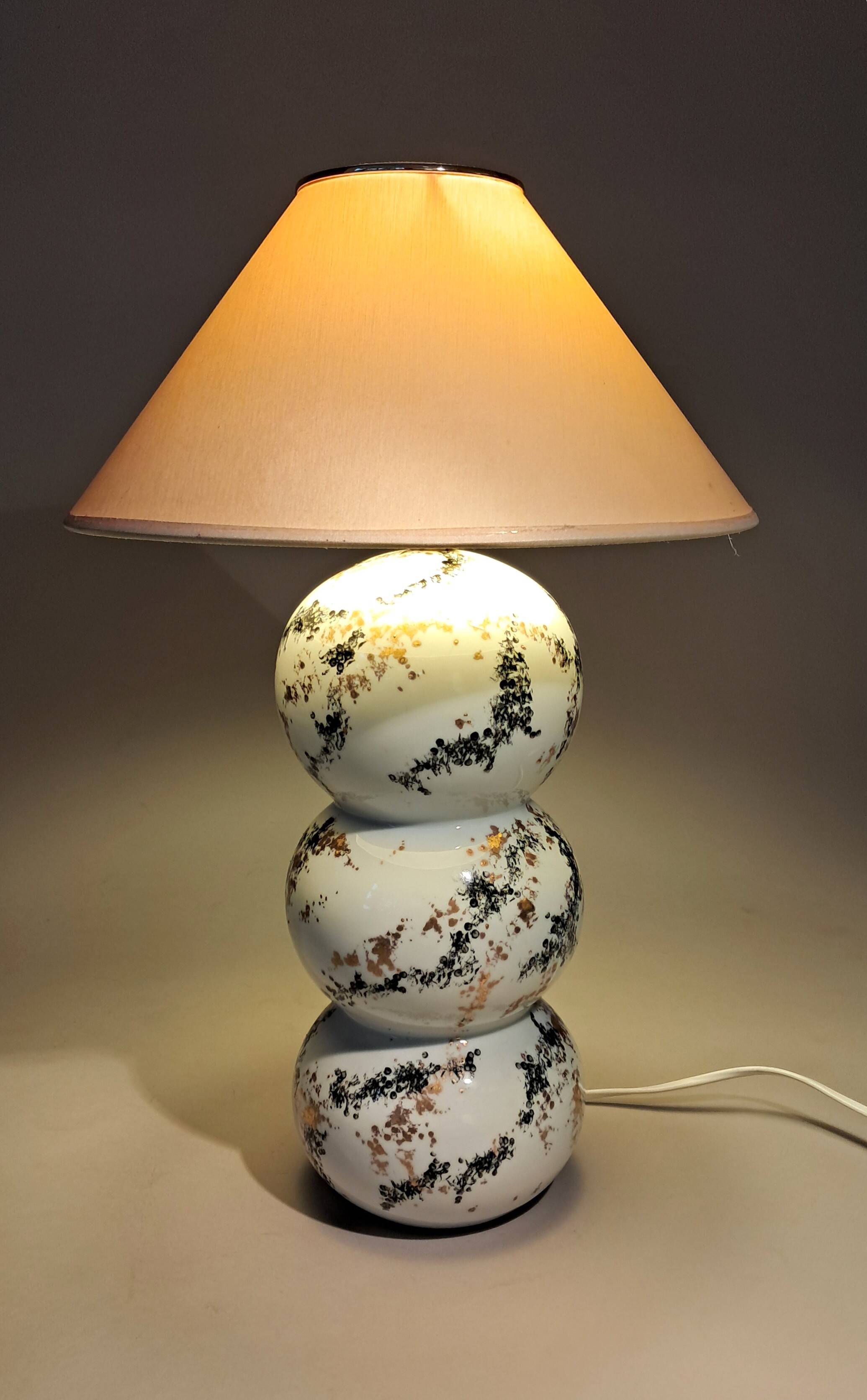 Fine porcelain lamp painted and gilded with fine gold. Laure Selignac, Paris.