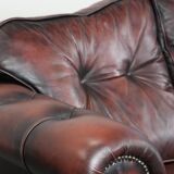 Red 2.5-seater Chesterfield sofa on wheels in English style