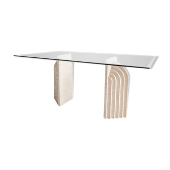 Dining table in travertine and glass with sculpted legs, 1970s.