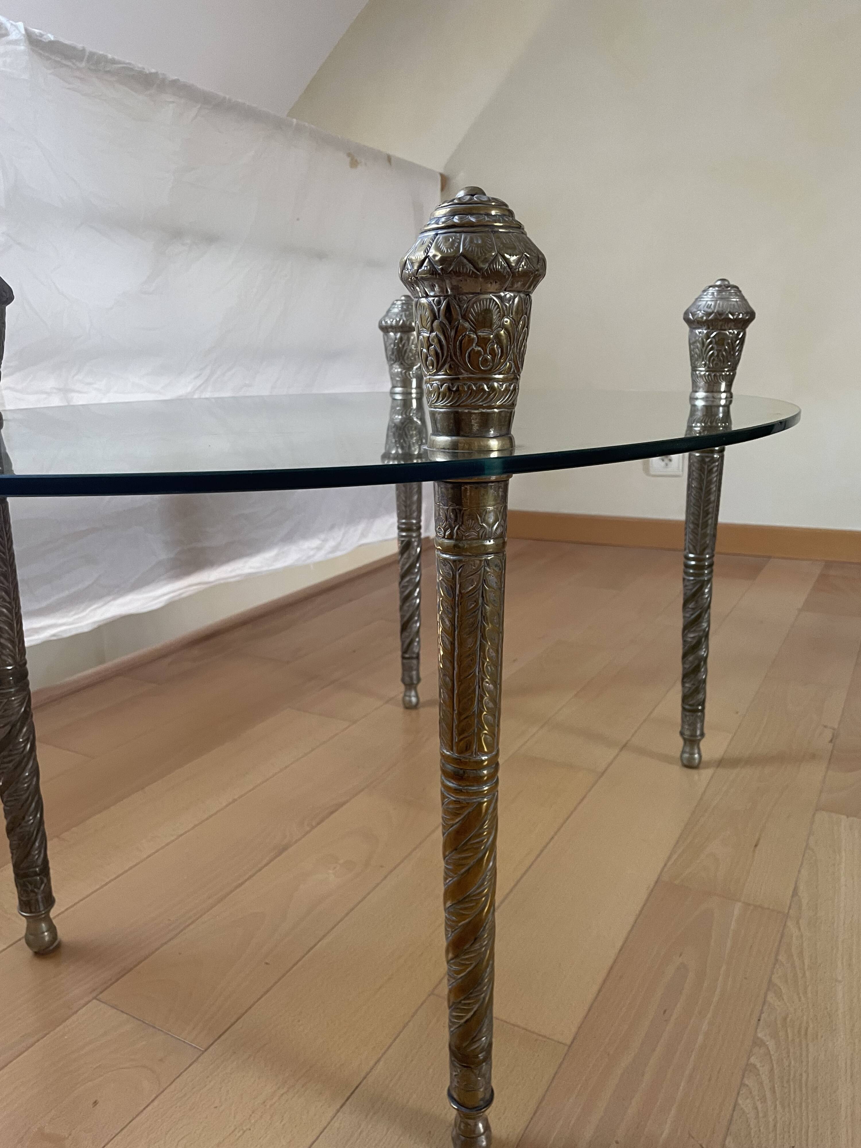 Glass coffee table with metal legs