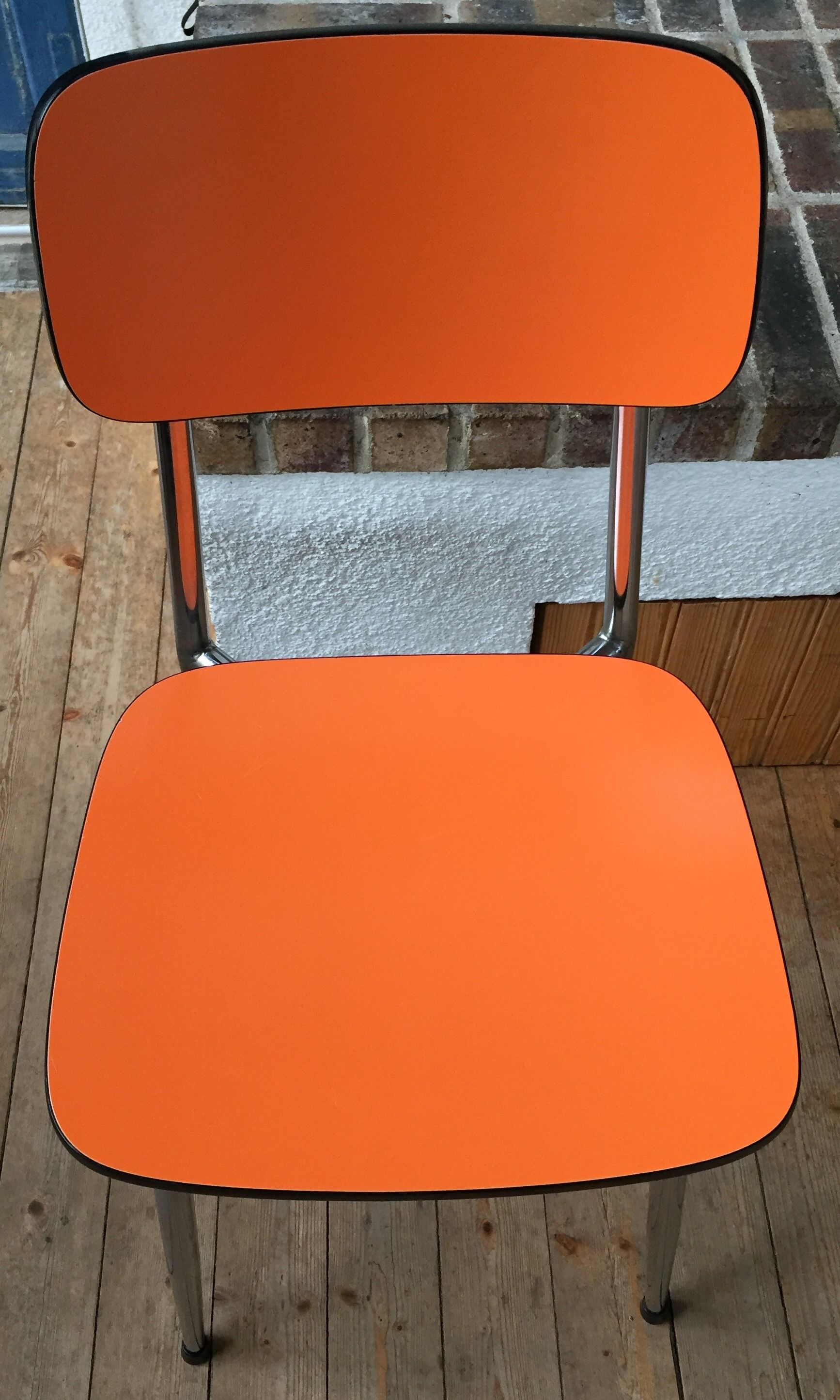 Lot of 4 vintage chairs in orange formica