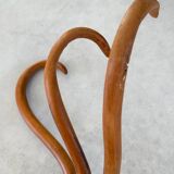 Pair of curved wooden coat racks or hooks from the 1900s
