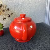 Vintage red teapot with white polka dots