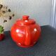 Vintage red teapot with white polka dots