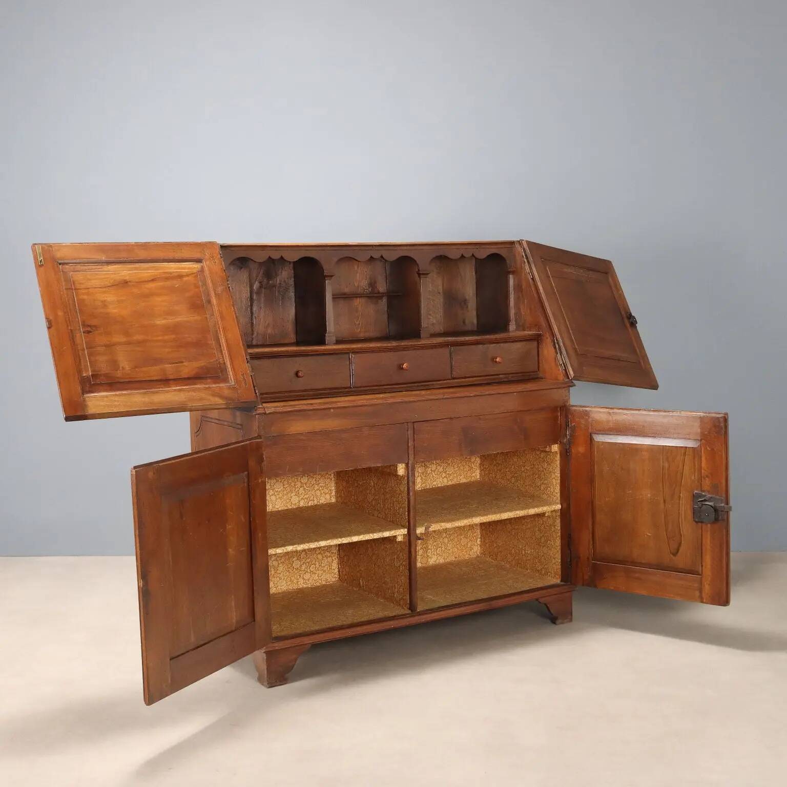 Antique walnut sideboard with pine drawers, Italy, 19th century.