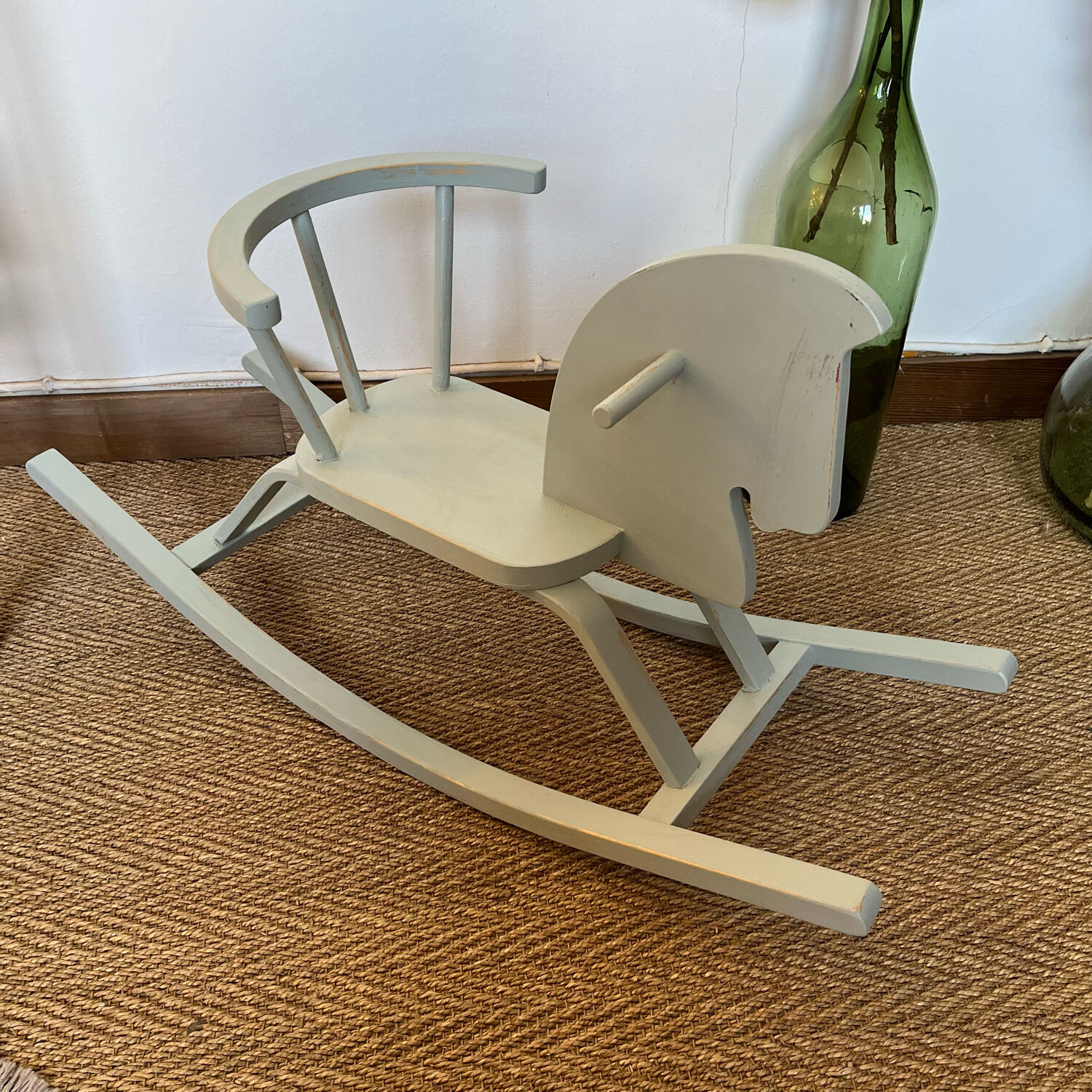 Vintage wooden rocking horse in its patina